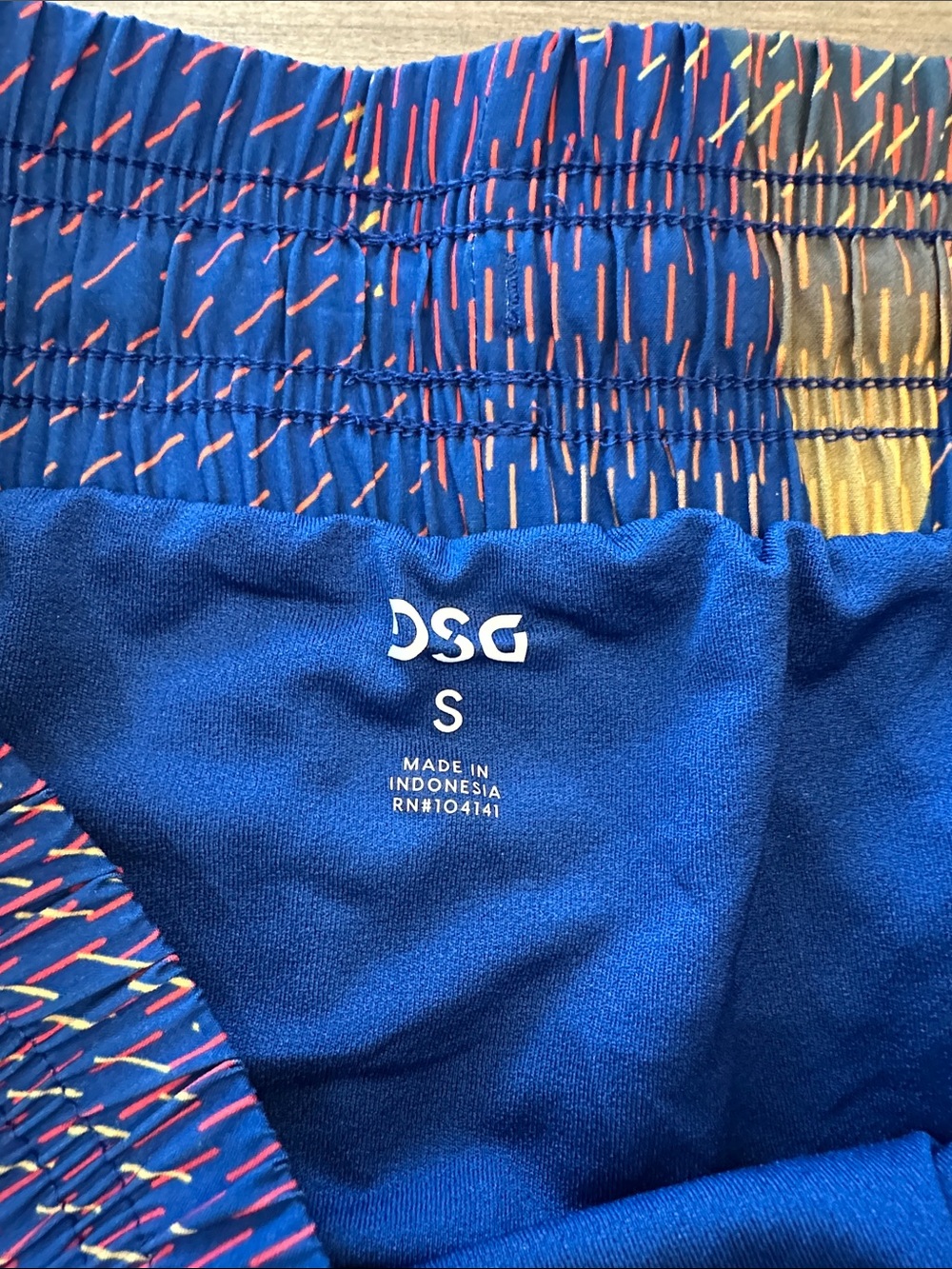 DSG Blue Geometric Athletic Shorts with Yellow Accents - Picture 2 of 6